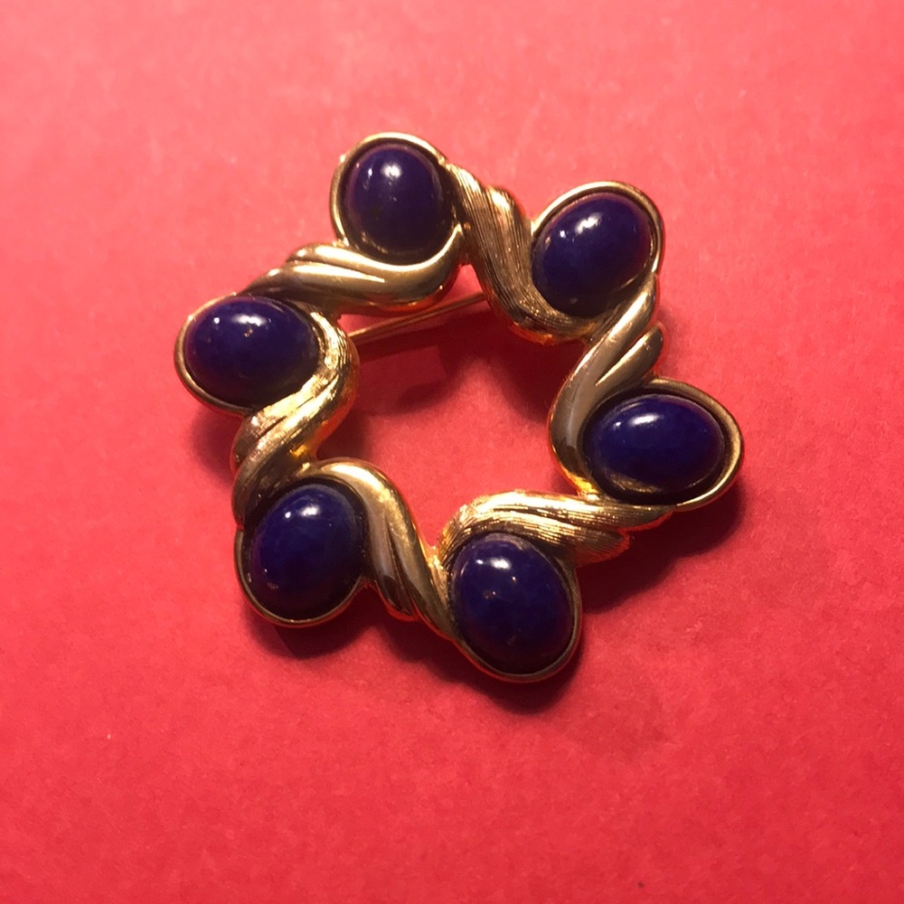 Napier gold tone brooch